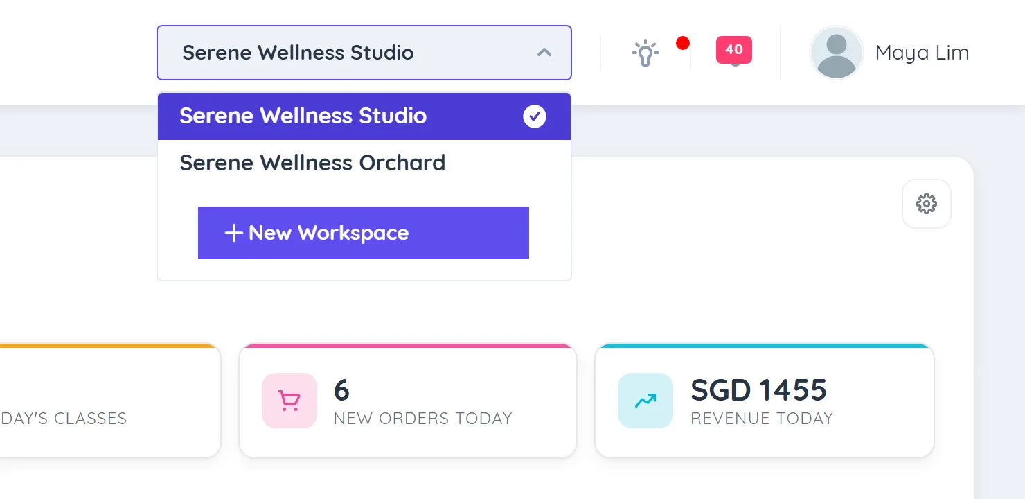 The workspace dropdown at the top of the screen open, listing Serene Wellness Studio with a tick, Serene Wellness Orchard and the New Workspace option